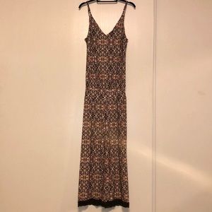 Printed romper with crochet detail at ankle